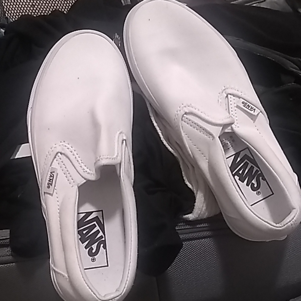 White slip on vans